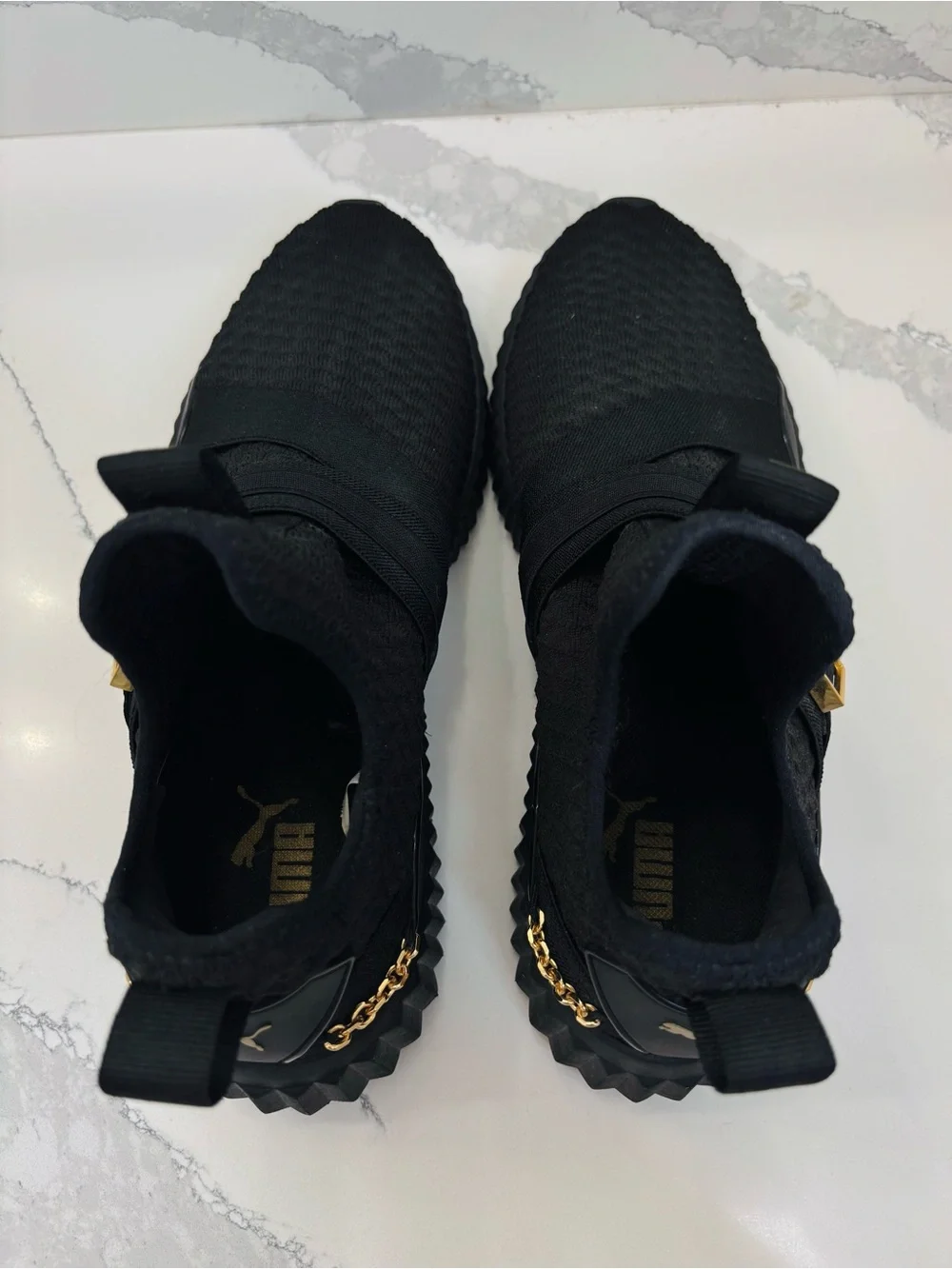 PUMA Women’s 10 Defy Mid Black Training Sneakers with Gold Buckle and Chain